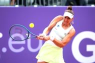 Beatriz Haddad Maia of Brazil plays a shot against Emma Navarro of the USA in their women's singles match during day four of the Internationaux de Strasbourg. Source: Getty